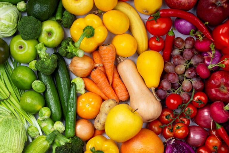 Assorted fruits and vegetables illustrates blog "Does "Produce" Refer to Fruits or Vegetables?"