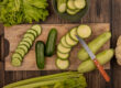 Chef preparing Persian cucumbers for salads and appetizers