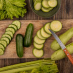 Chef preparing Persian cucumbers for salads and appetizers