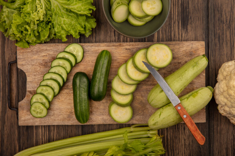 Chef preparing Persian cucumbers for salads and appetizers