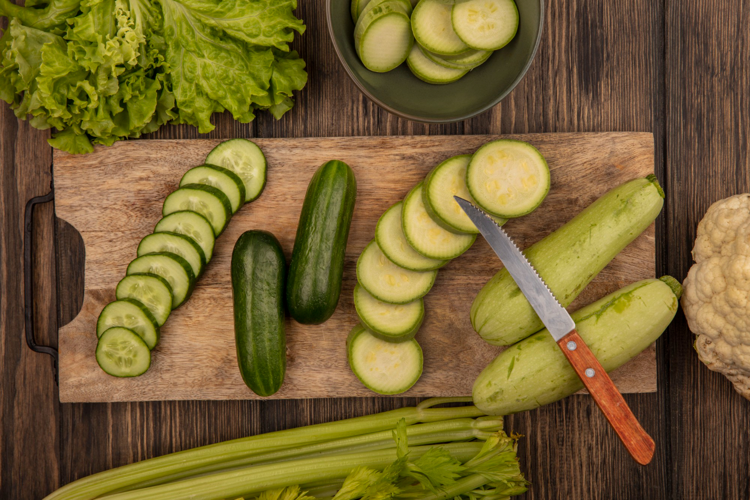 76027 Chef preparing Persian cucumbers for salads and appetizers