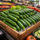 Persian cucumbers retail display in grocery store produce section