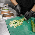 Fresh Persian cucumbers prepared in a foodservice kitchen for efficient use