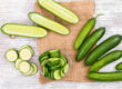 Persian cucumbers compared with traditional cucumbers on display