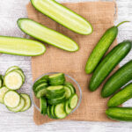 Persian cucumbers compared with traditional cucumbers on display