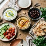 Fresh Persian cucumbers served with tzatziki, hummus, and traditional Mediterranean dishes